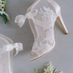 NIKKI IVORY Ivory Ribbon Tie Lace Embroidered Bootie